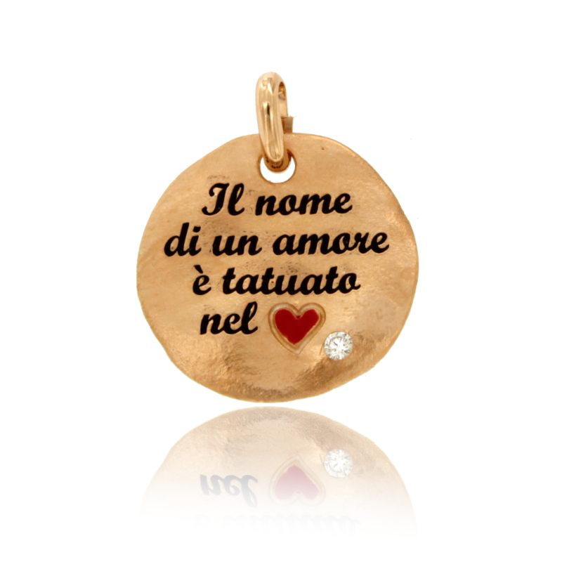 CIONDOLO TONDO MM 24 IL NOME DI UN AMORE E' TATUATO NEL CUORE IN ARGENTO ROSATO TIT 925 SMALTO E ZIRCONE