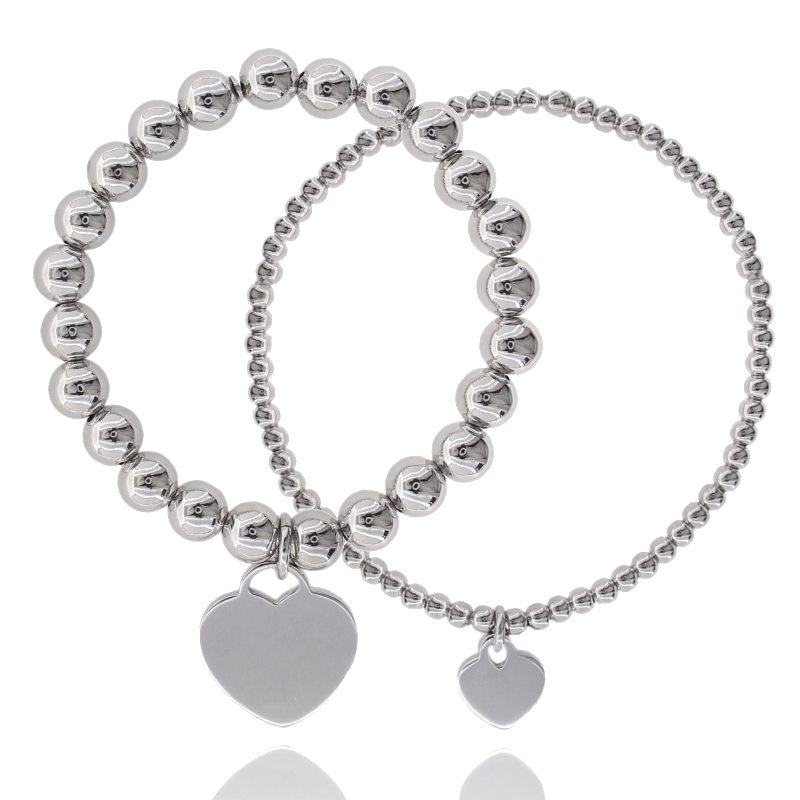 BRACCIALE ELASTICO CON SFERE E CUORE PENDENTE IN ARGENTO RODIATO TIT 925