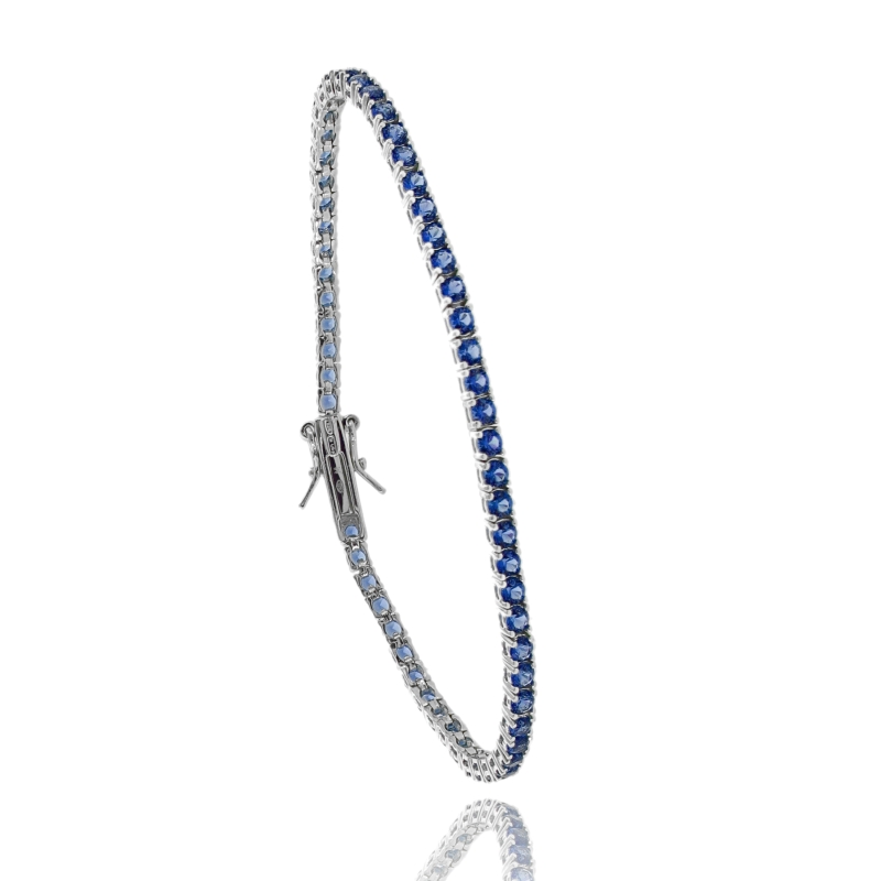 BRACCIALE TENNIS 4 GRIFFE CON ZIRCONI BLU IN ARGENTO TIT 925