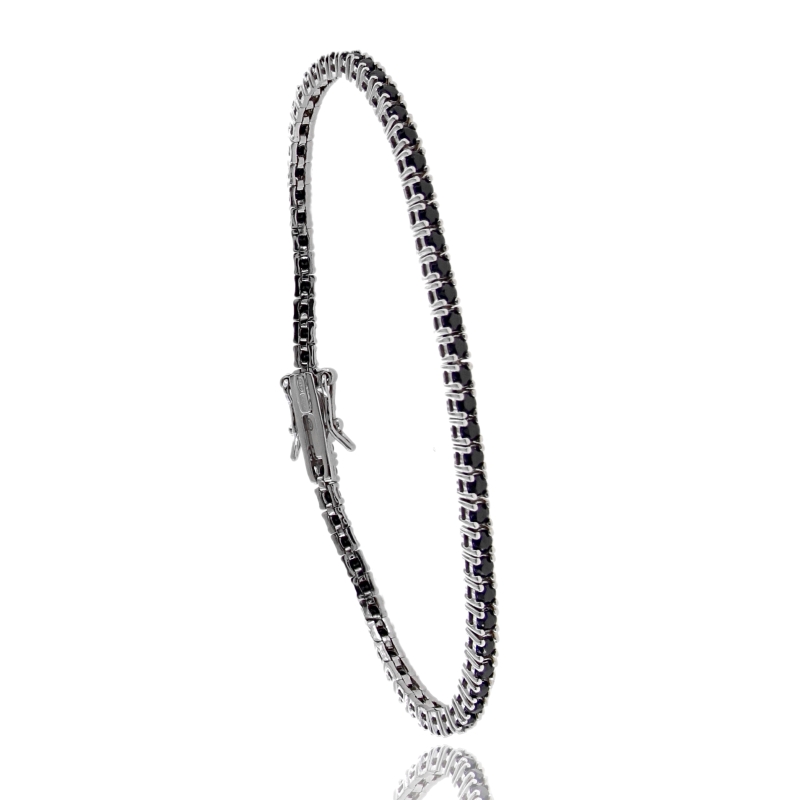 BRACCIALE TENNIS 4 GRIFFE CON ZIRCONI NERI IN ARGENTO TIT 925