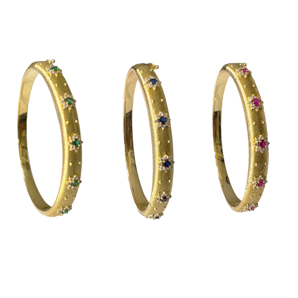 BRACCIALE RIGIDO CON ZIRCONI IN OTTORE